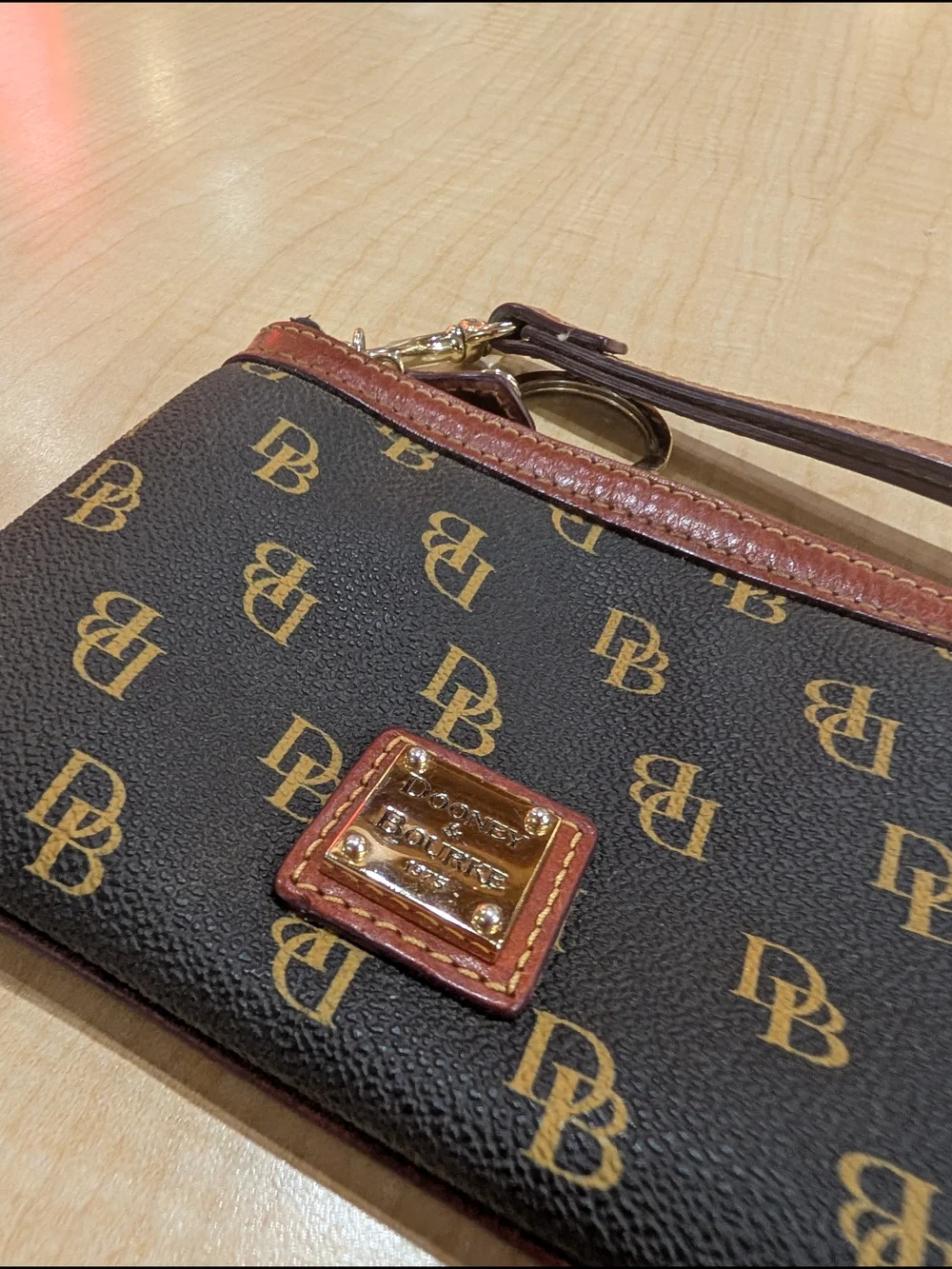 Dooney & Bourke Brown Logo Wristlet